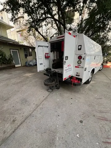 Magnet Plumbing service vehicle on-site for Grease Trap Cleaning in Miami Shores